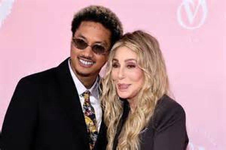 Alexander Edwards, left, and Cher arrive at the Versace Fall/Winter collection presentation, at the Pacific Design Center in West Hollywood, Calif Versace Fall/Winter 2023 - Arrivals, West Hollywood, United States - 09 Mar 2023