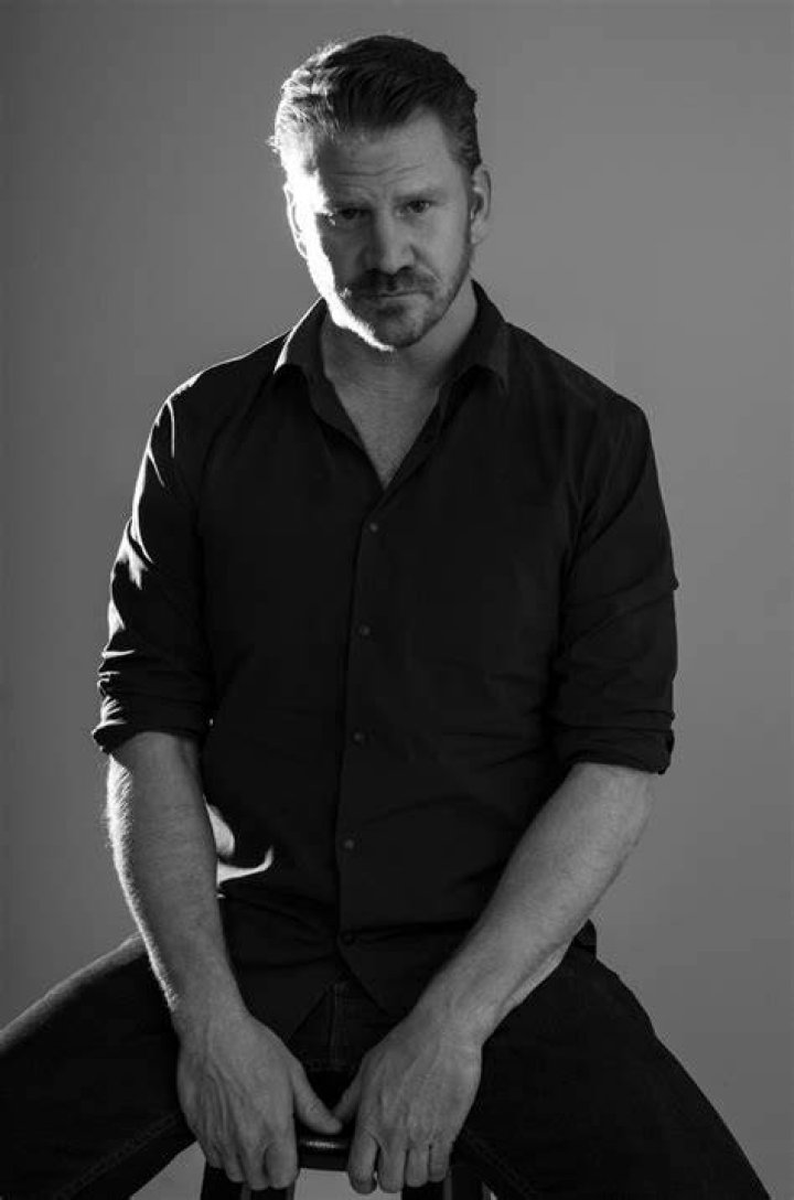 Dash Mihok Poses For A Photo