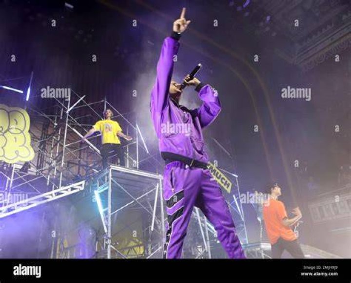 Edwin Honoret singing during the PRETTYMUCH: FOMO Tour