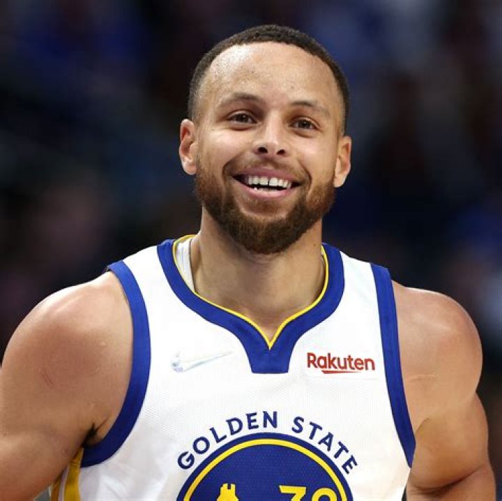 Steph Curry goes in for a score